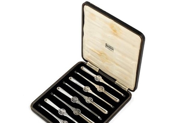 A set of eight silver lobster picks by Finnigan's Ltd of Manchester