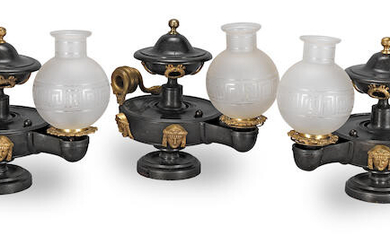 A set of three Regency gilt-bronze mounted patinated bronze Colza lamps