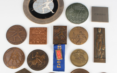 A small group of mid-20th century Olympic medallions and awards, purportedly won by Charles de Beaum