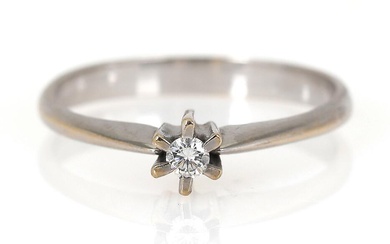 A solitaire diamond ring set with a brilliant-cut diamond, mounted in 18k...