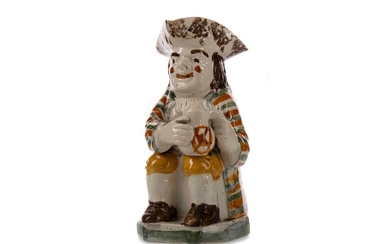 AN EARLY 19TH CENTURY TOBY JUG