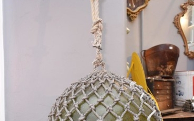 AN EXTRA LARGE 1940s ROPE BOUND GLASS FISHING FLOAT