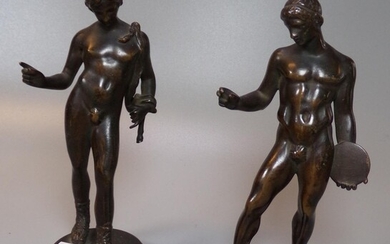 After the antique, a pair of nude Greek bronze...