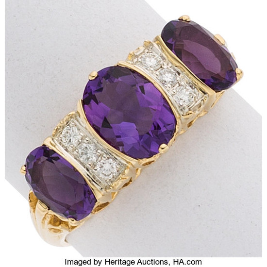 Amethyst, Diamond, Gold Ring The ring centers oval-shaped amethyst...