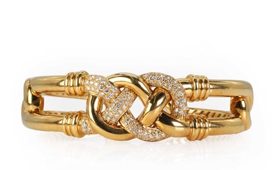 An 18ct gold and diamond bangle, by Asprey