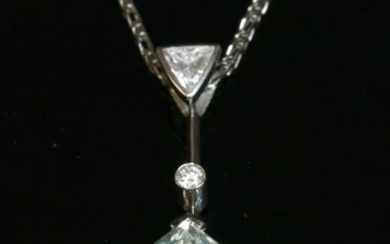 An 18ct white gold aquamarine and diamond pendant