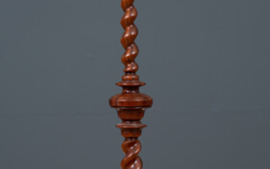 An 18th century yew wood torchiere