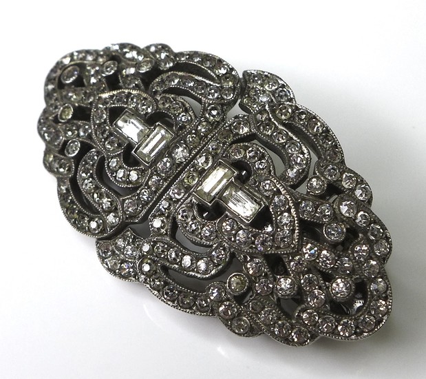 An Art Deco metamorphic brooch, white metal and set with pas...