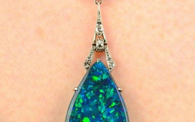 An Art Deco platinum and gold black opal and diamond geometric pendant, on chain.Opal estimated
