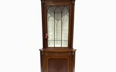 An Edwardian mahogany corner standing vitrine, circa 1910, a...