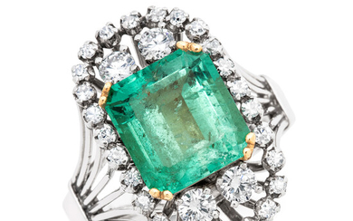 An Emerald, Diamond and Platinum Ring