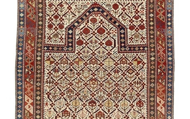 SOLD. An antique Daghestan prayer rug, Caucasus. Flower-filled trellis pattern with mirab on an ivory field. 1880-1900. 137 x 109 cm. – Bruun Rasmussen Auctioneers of Fine Art