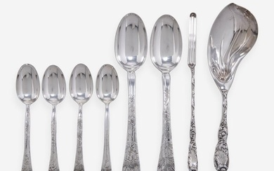 An assembled collection of forty-five sterling silver flatware and serving items in various