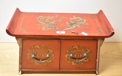 An early to mid-20th Century Chinese red lacquered cabinet, having two drawers, and measuring 33cm x