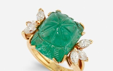 An emerald, diamond, and eighteen karat gold ring