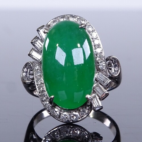 An unmarked white gold cabochon jadeite and diamond cluster ...