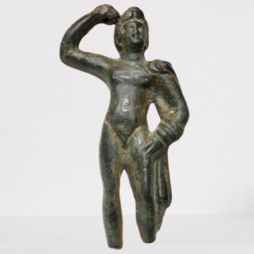 Ancient Roman Bronze Exquisite Statuette of Apollo in a Graceful pose wearing chlamys clasped at his right shoulder