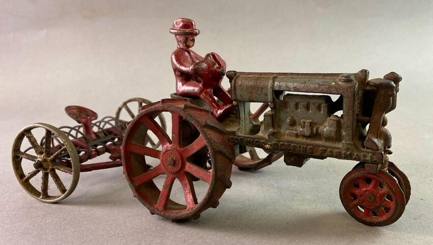Antique Arcade Cast Iron Tractor and Hay Rake