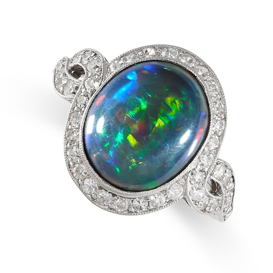 BAGUE EN OPALE NOIRE ET DIAMANT, sertie d'une opale noire ovale cabochon de 4,22 carats,...