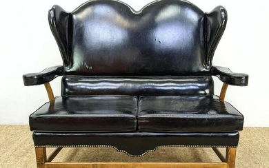 Black Leather Wing Love Seat. Double Arched Form Back.