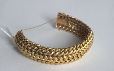 Bracelet à trois mailles en or jaune 750°/°°....