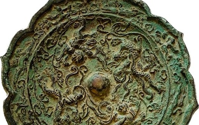 Bronze Ancient Chinese - Tang Dynasty ) octafoiled “immortals” mirror with animals and mythical creatures.