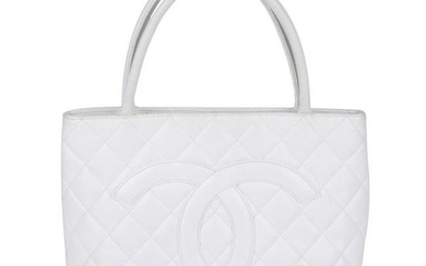 CHANEL - a white quilted Caviar Medallion Tote. Crafted
