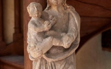 CHILD'S VIRGIN in carved limestone with traces of...