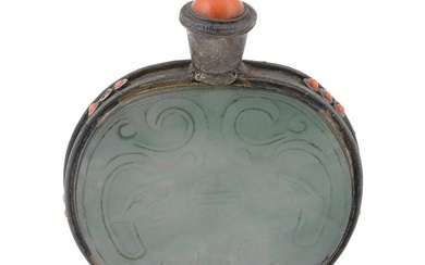 CHINESE CARVED LIGHT CELADON HARDSTONE SNUFF BOTTLE Late 19th Century Height 3". Coral stopper.