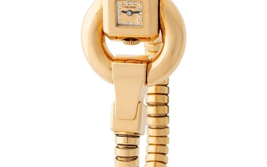 Cartier. Extremely Rare Anneaux Driver Turbogas Lady’s Bracelet Wristwatch in Yellow Gold, With Original Box