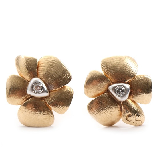 Charlotte Lynggaard: A pair of diamond earrings in the shape of flowers each set with brilliant-cut diamond, mounted in 14k gold. L. 1.5 cm. (2)