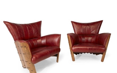 Contemporary design Pair of barrel armchairs, 21st century Leather,...
