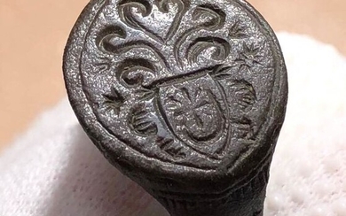 Crusaders Era Bronze Ring with an interesting Coat of Arms of a noble family- Cross in a Shield and Opulent Floral Motifs