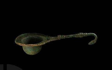 Etruscan Kitchen Utensil with Animal Head Finial