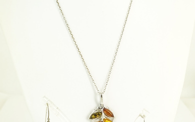 FOUR STERLING SILVER AND AMBER-SET PIECES
