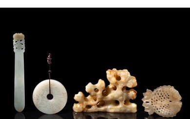 Four Chinese white, celadon and russet jade carvings, QingL....