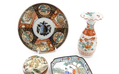 Four Oriental items comprising a dish decorated in the Imari...