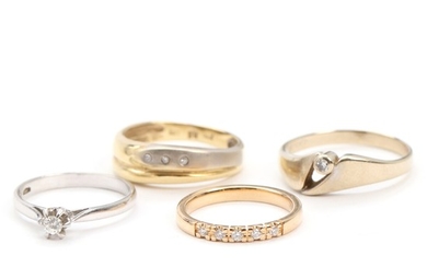 Four diamond rings, mounted in 14k and 18k gold and white gold. Size 49–59. Weight app. 9.5 g. (4)