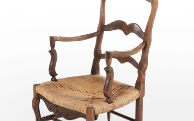 French Provincial Style Carved Walnut Ladderback Armchair with Rush Seat