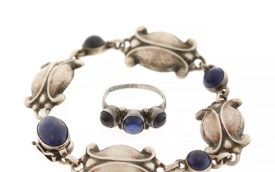 Georg Jensen: A lapis bracelet set with lapis cabochons, mounted in sterling silver. Design no. 11. Georg Jensen 1930–1945. Accompanied by ring.