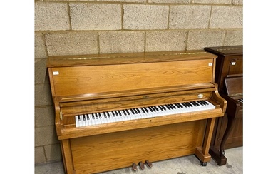 Hyundai (c1991) A Model U852 upright piano in a light oak ca...