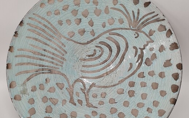 Jean BESNARD (1889-1958), Grand plat en céramique émaillé à décor en réserve d'un oiseau stylisés,...