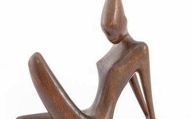 Karl Schmidt (Austrian, b. 1948) Werkstatte sculpture in wood depicting a reclining nude woman, atop