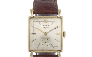 LONGINES - a gentleman's yellow metal wrist watch.