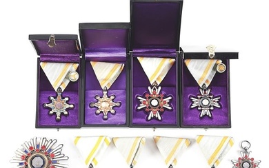 LOT OF JAPANESE ORDER OF THE SACRED TREASURE MEDALS.