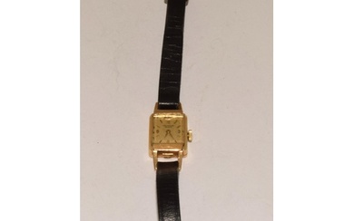 Ladies 14ct gold head manual wind watch on leather strap