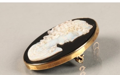 Ladies 9ct yellow gold mounted opal cameo brooch.