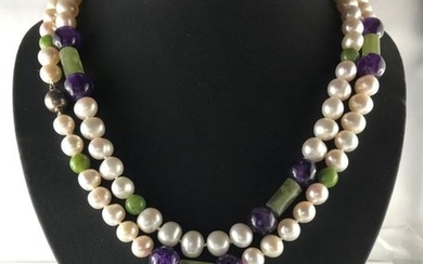 Long necklace of freshwater cultured pearls of approx....