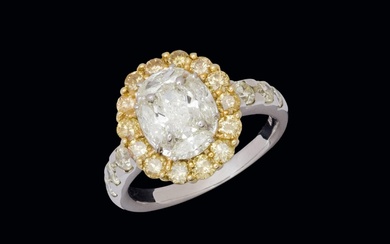 Oval diamond and fancy gold ring