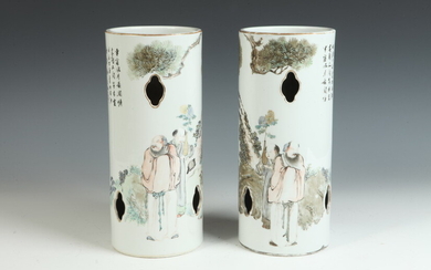 PAIR CHINESE POLYCHROME PORCELAIN CYLINDRICAL HAT STANDS WITH FIGURAL AND...